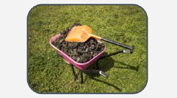 Horse muck in wheelbarrow